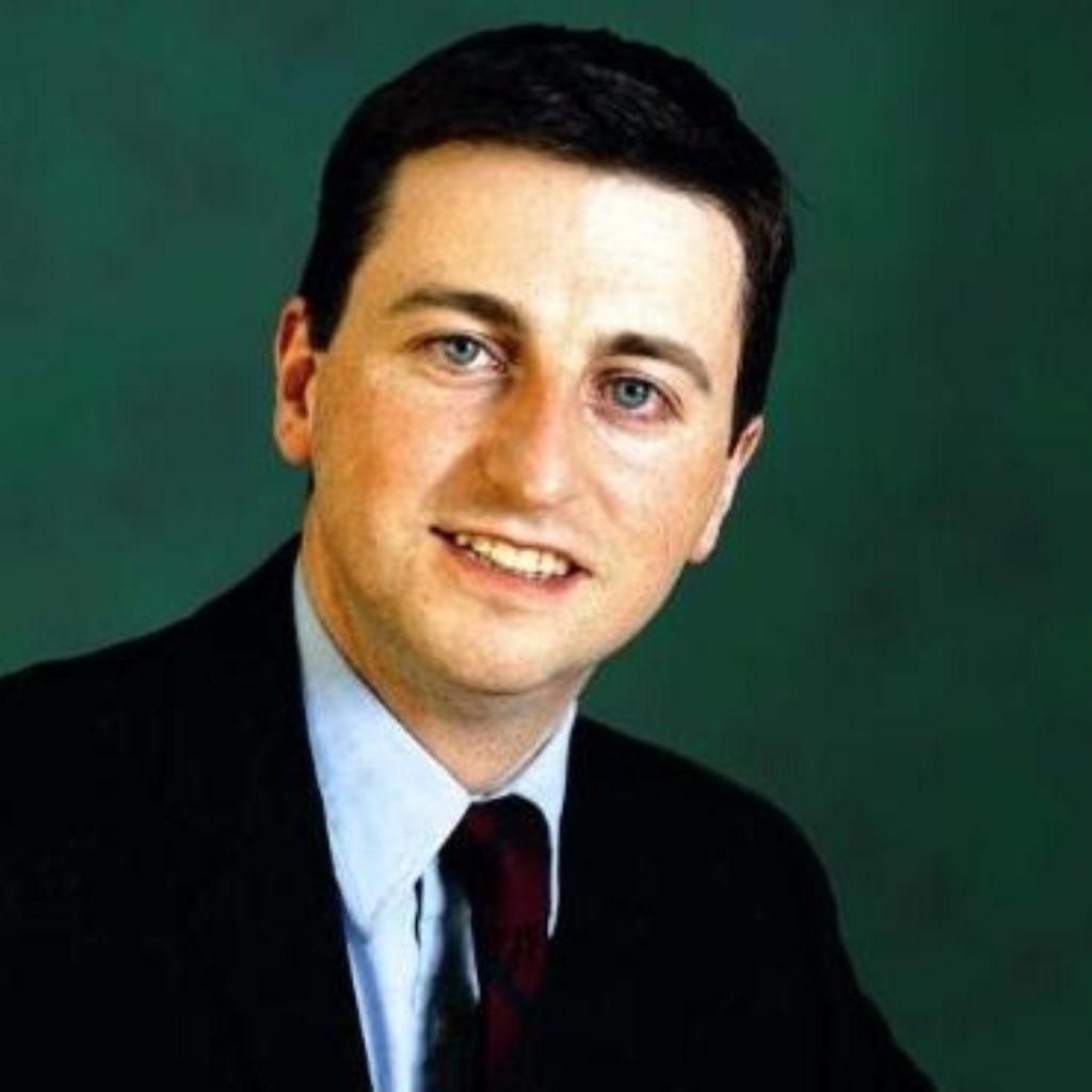 Transport secretary Douglas Alexander backs national road tolls