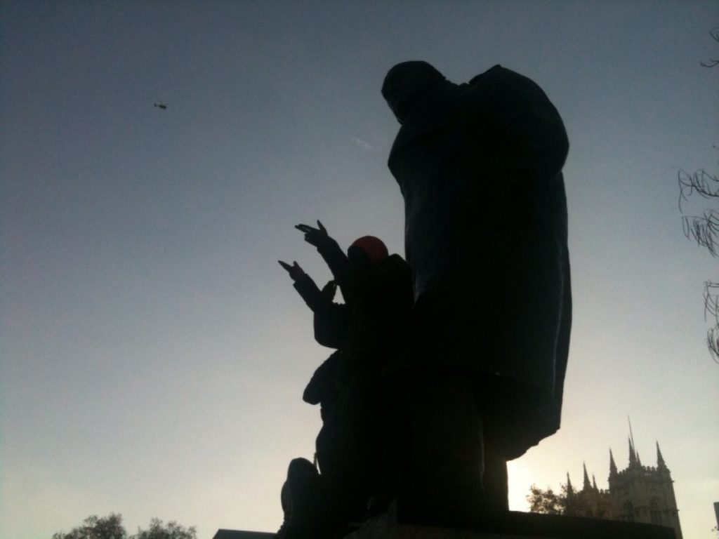 Protestors clamber onto the Churchill statue during last week