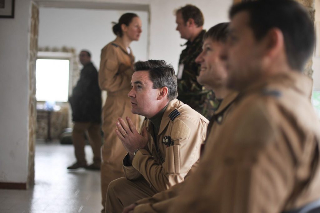 An RAF pilot prepares for a mission over Libya after a briefing in Gioia Del Colle, Italy