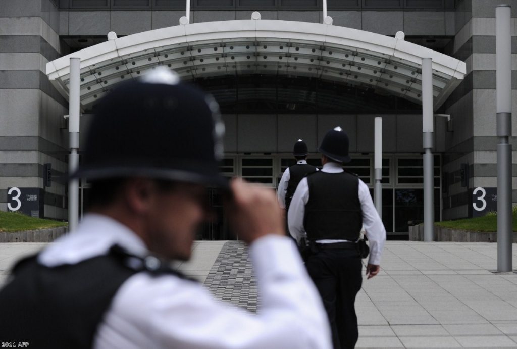 Police in Wapping.  Journalists complain about their presence in newspaper offices.