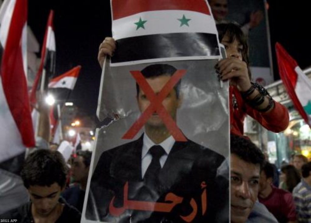 Palestinians protest against Bashir in Ramallah last year.