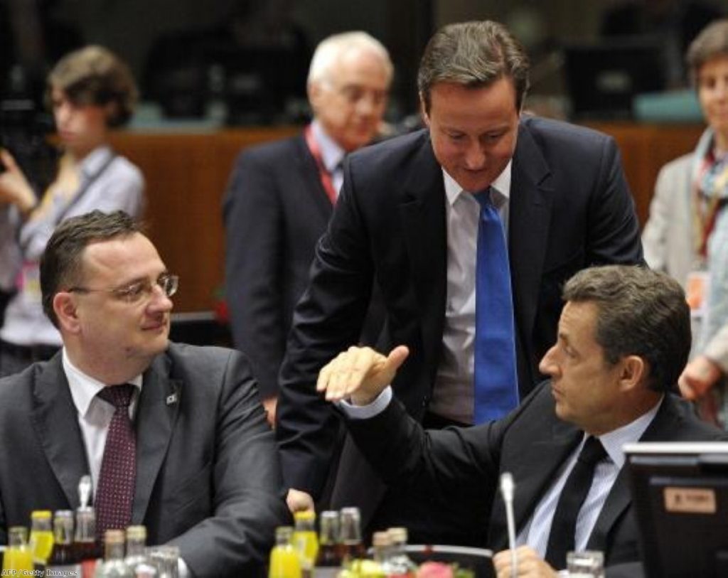 David Cameron keeps an eye on Nicolas Sarkozy