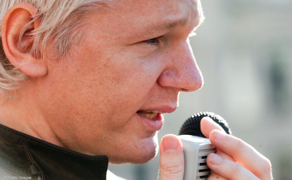 Julian Assange speaks to the crows during a recent Occupy London protest