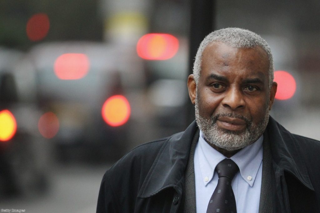 Neville Lawrence, father of Stephen, arrives at court during the trial.