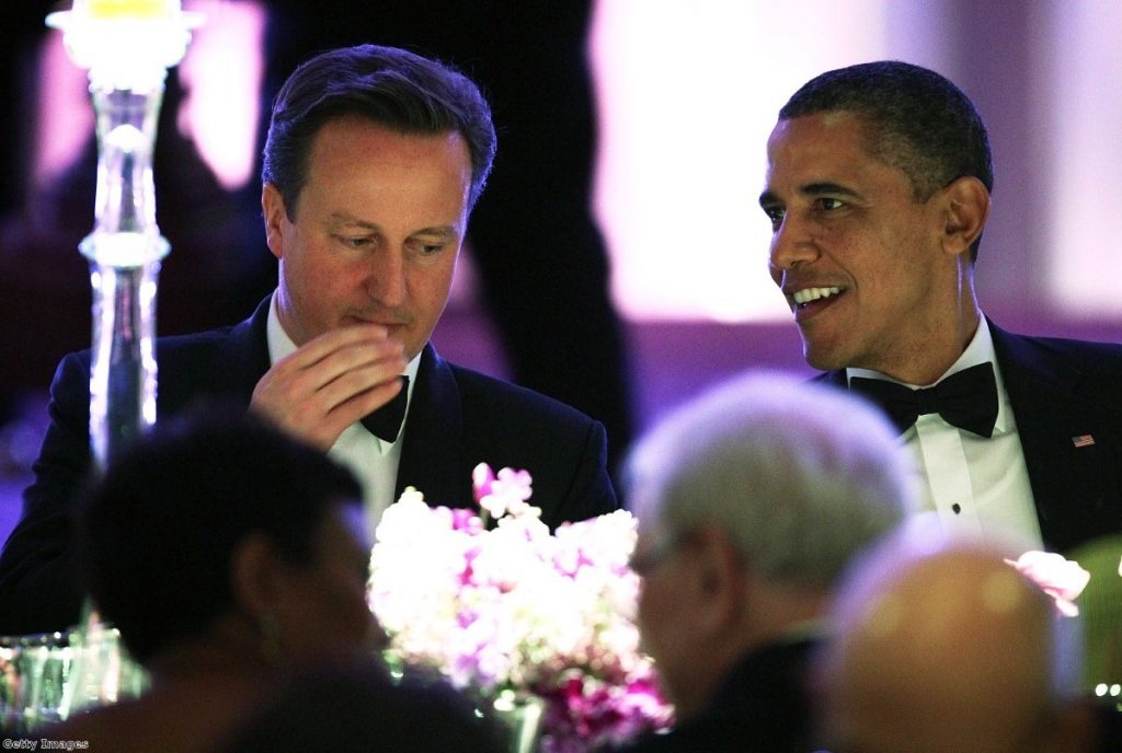 Cameron and Obama share a joke during last night