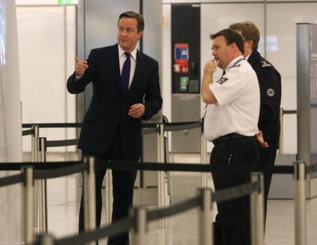 David Cameron inspects UK border controls at Heathrow airport 