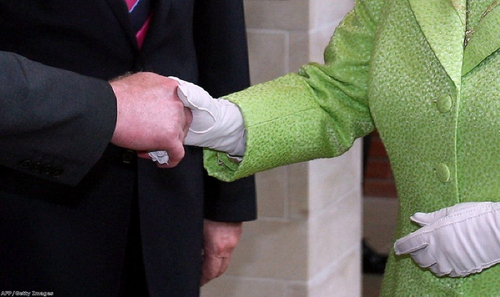 Martin McGuinness shakes the Queen