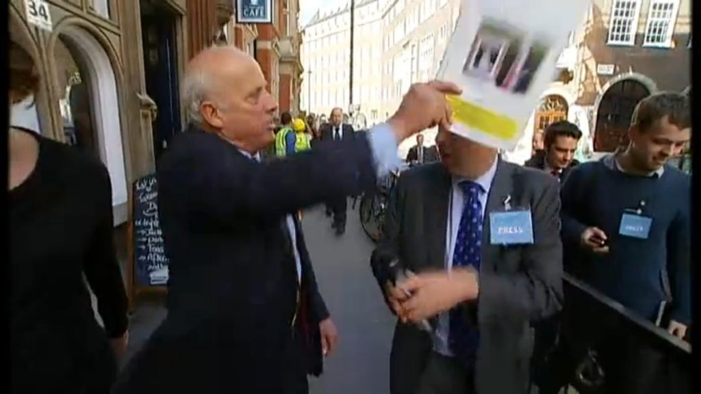 Godfrey Bloom hits Michael Crick with a Ukip brochure 