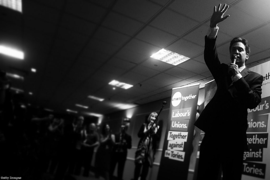 Miliband greets delegates during a fringe event at the Labour party conference 