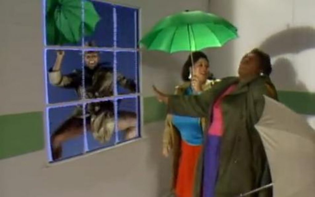 A still from the Weather Girls' It's Raining Men takes a visual interpretation of the song to extremes