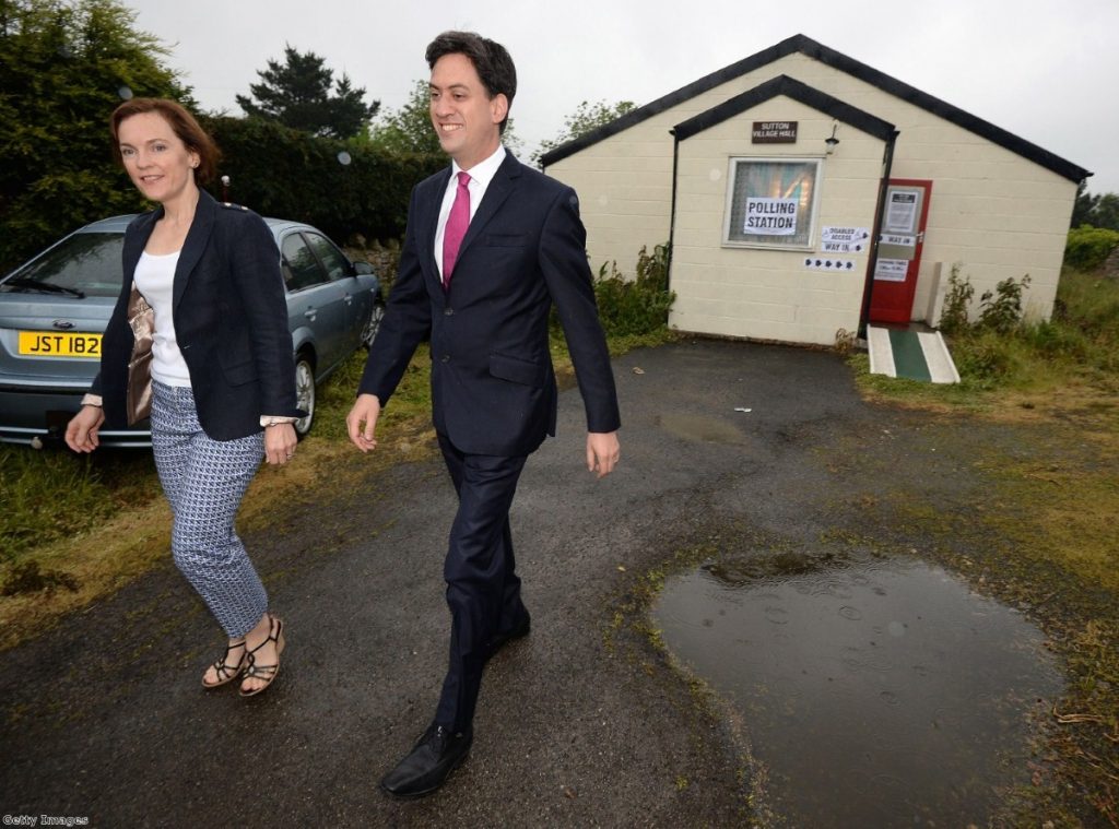 Miliband and wife Justine leave Sutton Village Hall after voting this morning  