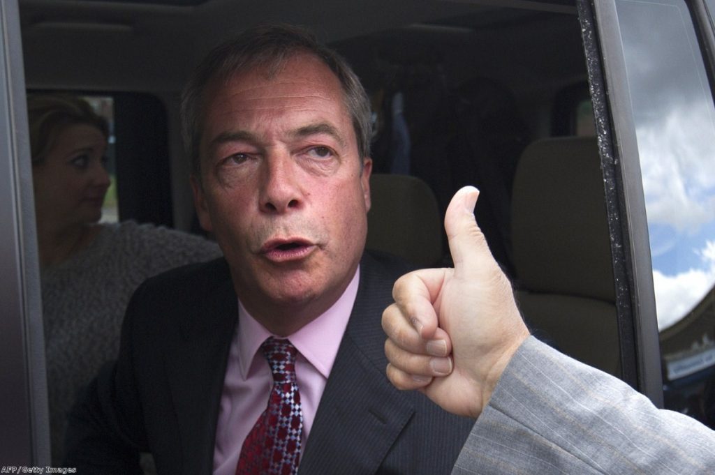 Nigel Farage is greeted by a supporter following the local elections, but he hasn