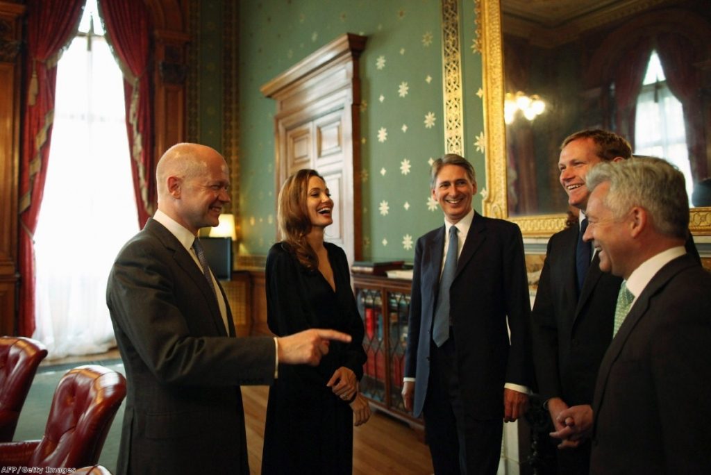 Angelina Jolie shares a joke with British ministers, but in the asylum system, her programme is being ignored  