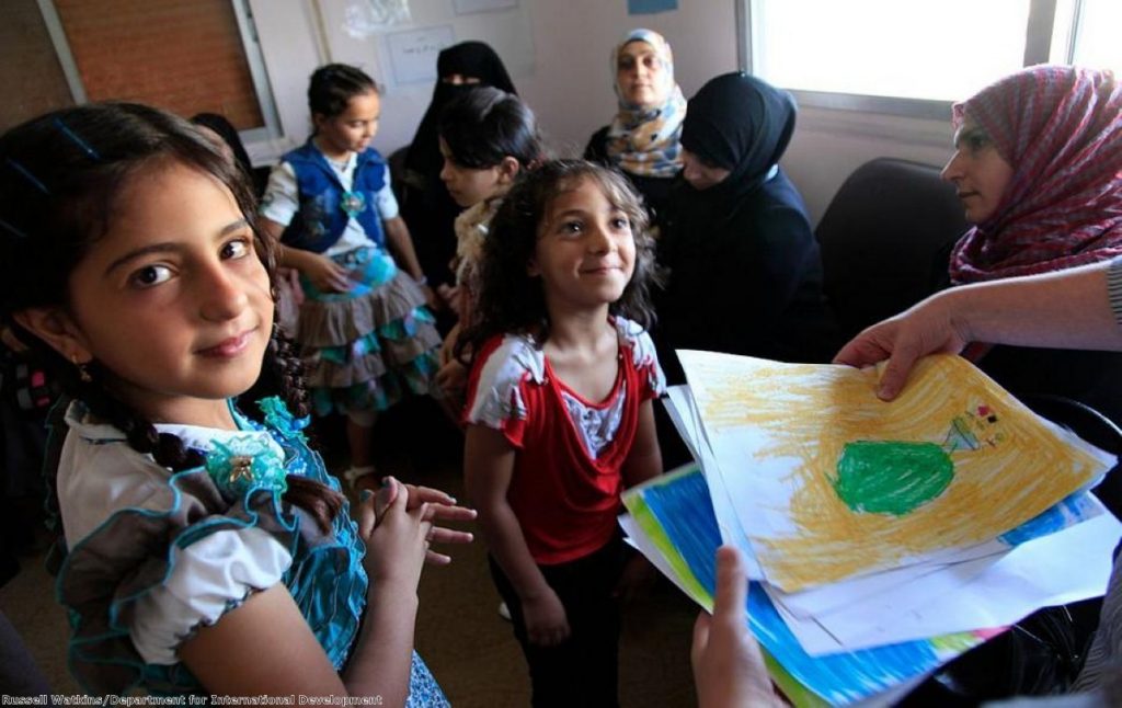 Refugee children from Syria at a clinic in Ramtha, northern Jordan. British efforts are centred on this still in the Middle East