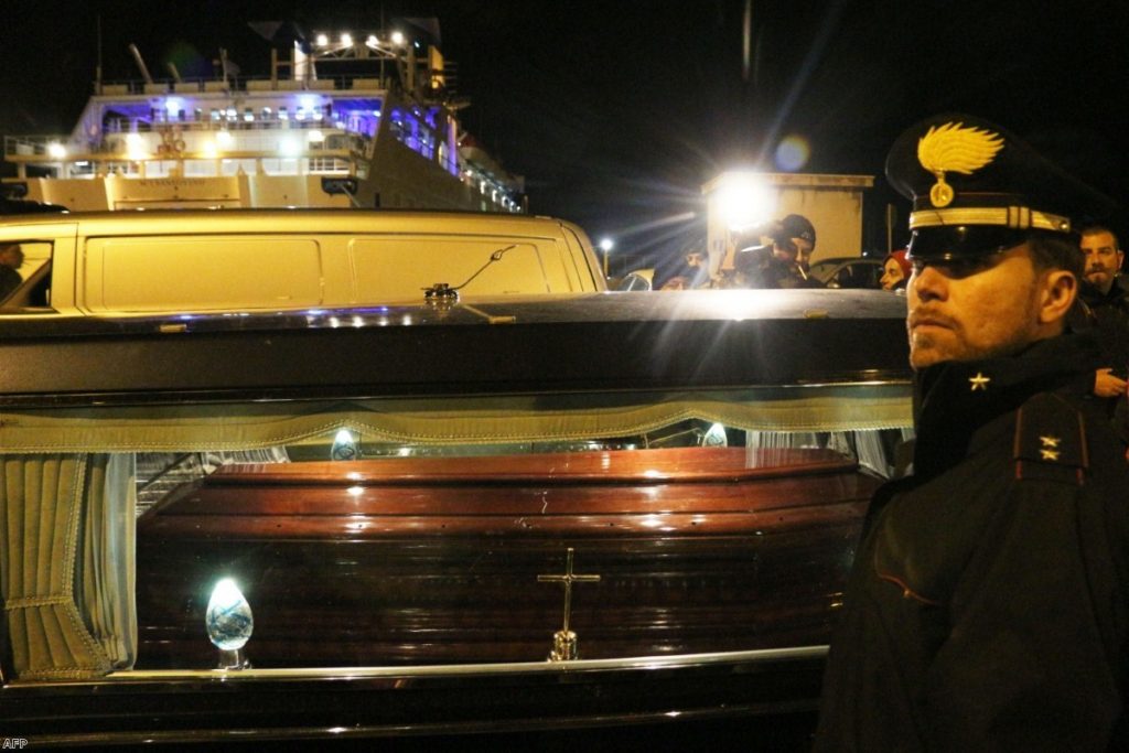 Coffins with the bodies of immigrants who died trying to reach the Italian coast arrive from Lampedusa in Porto Empedocle where they will be buried in cemeteries 