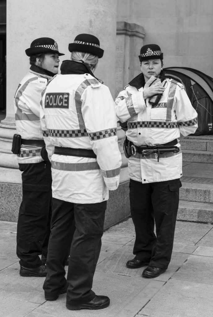 Police at the Manchester camp, where activists are demanding home for all