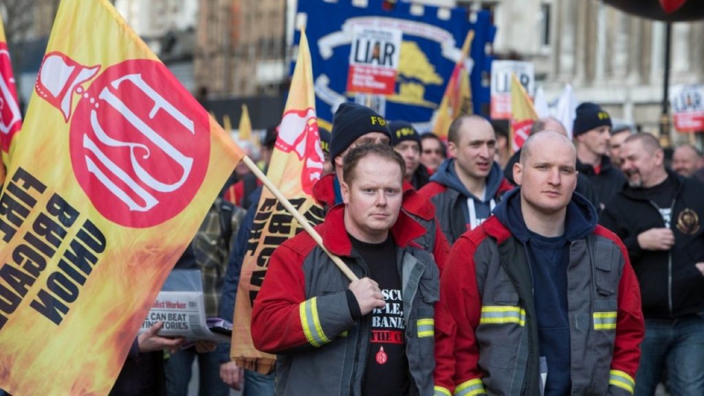 Members of the Fire Brigades Union on a protest march