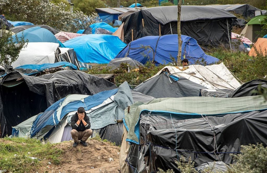 Cameron called the people in Calais refugee camps a "bunch of migrants" during today