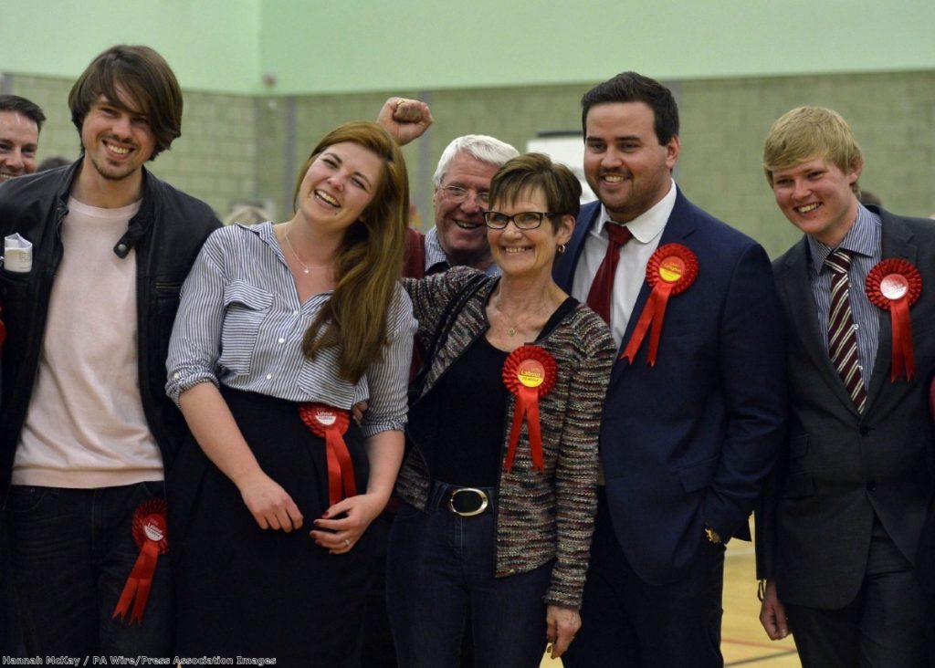 Party members celebrate after Kayte Block (second left) wins the Labour seat for Vange ward during the election count for Basildon  