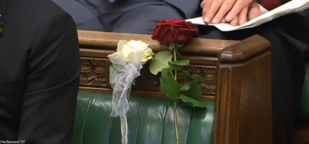 Two roses marked Jo Cox