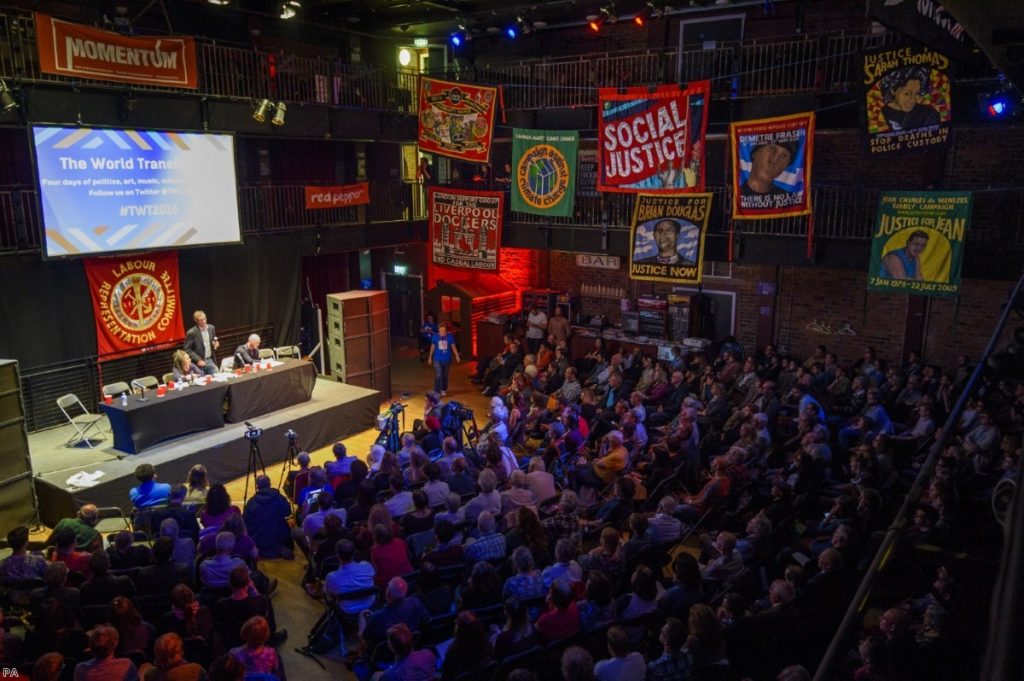 People watch speakers at a panel discussion at The World Transformed, at the Black-E centre in Liverpool.