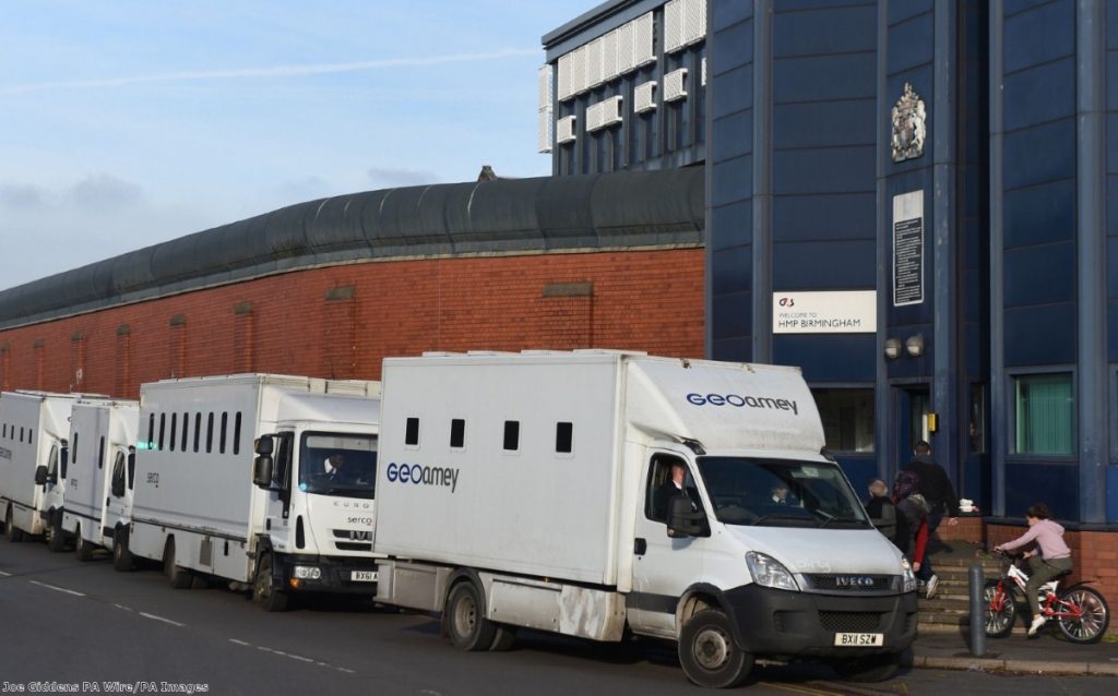 Custody vans wait to move prisoners out of HMP Birmingham after Friday