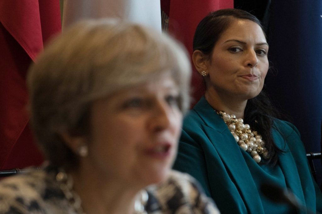 Priti Patel stares at Theresa May during a meeting with UN secretary general Antonio Guterres on how to tackle modern day slavery  