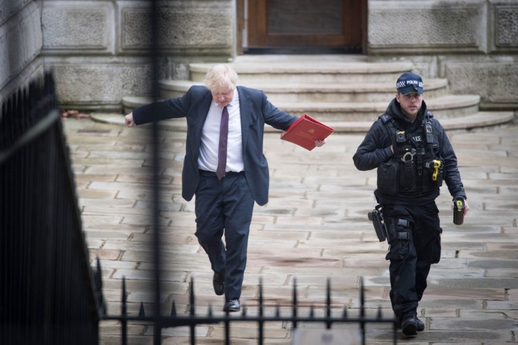 The foreign secretary waves his arms around as he arrives in Downing Street for a Cabinet meeting. 