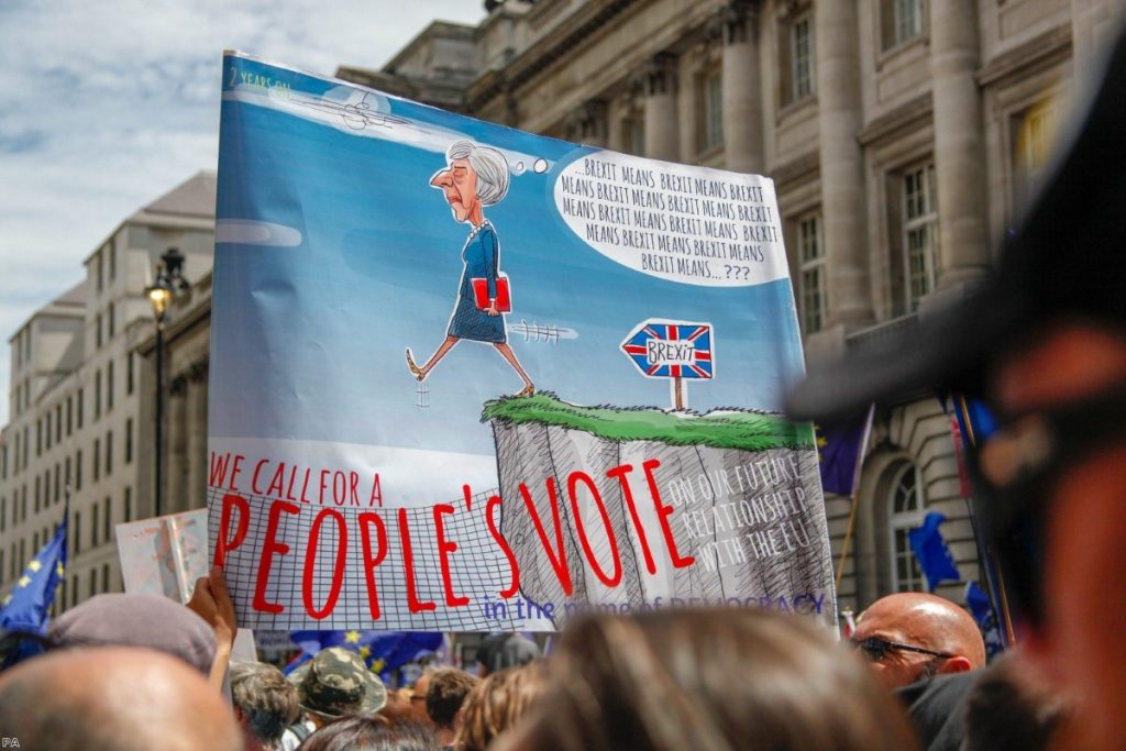 Protestors march during the People