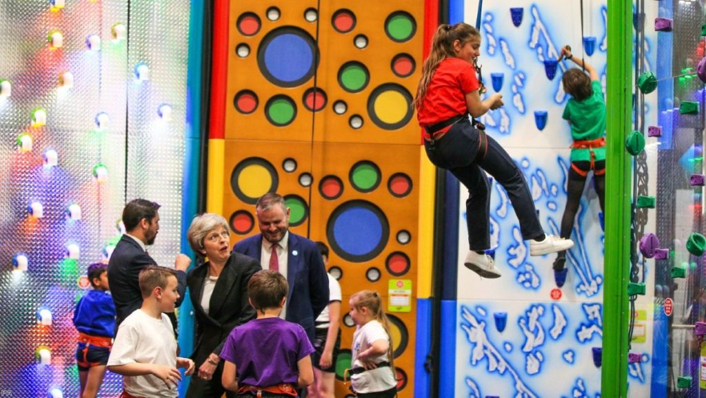 Theresa May watches children climbing while on the local election campaign trial. Faith in her Brexit policy is now almost completely eroded. 