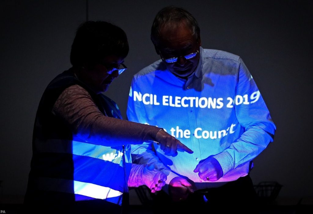 Counting of ballots begins in the Northern Ireland local elections as at Coleraine Leisure centre in County Londonderry.