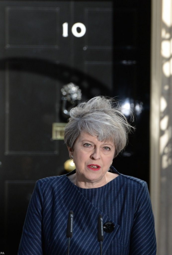 Theresa May cuts a lonely figure as she prepares to leave office