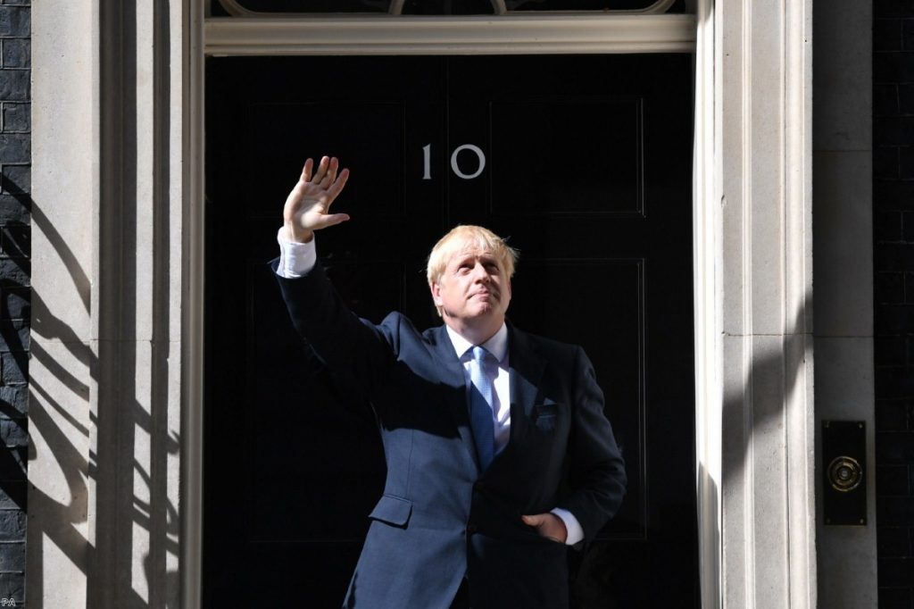 Johnson outside No.10 after he returns from seeing the Queen 