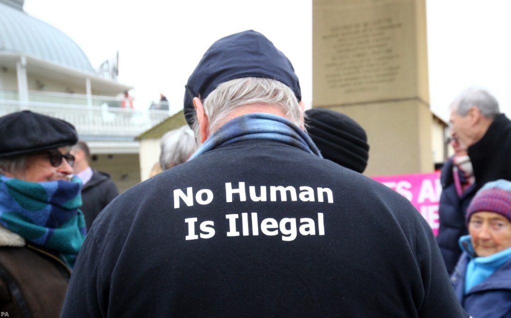 Members of the Kent Anti-Racism Network hold a vigil in Ramsgate to welcome refugees. 