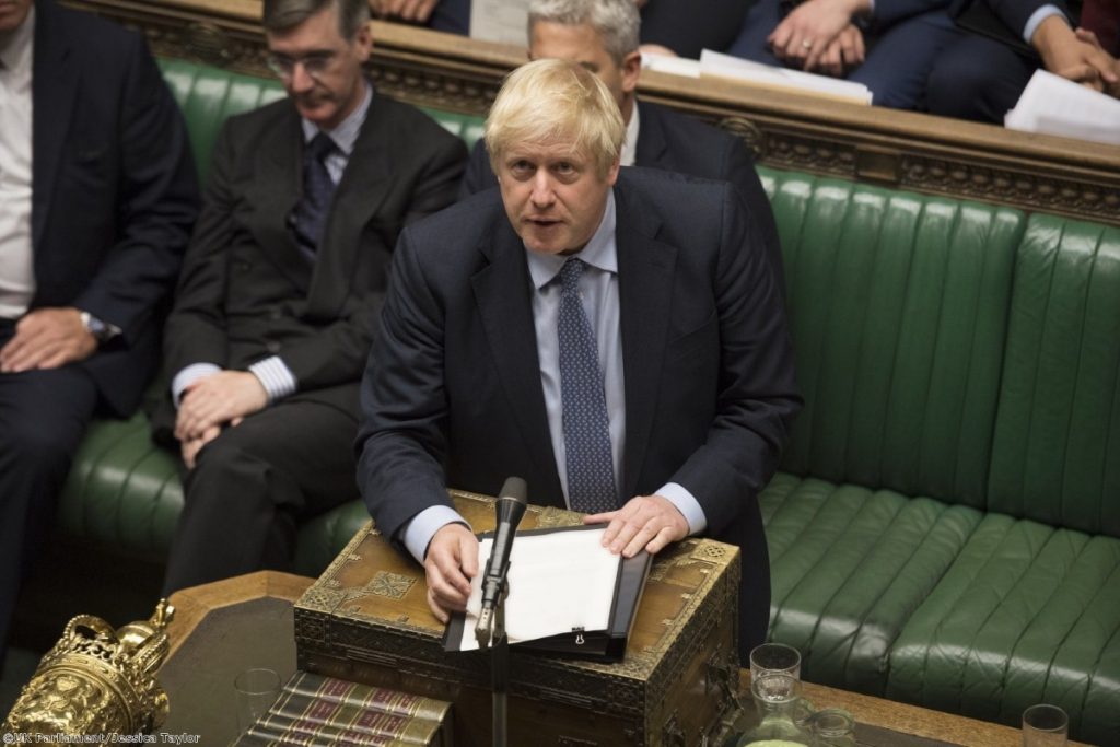 Boris Johnson gazes upwards during tonight