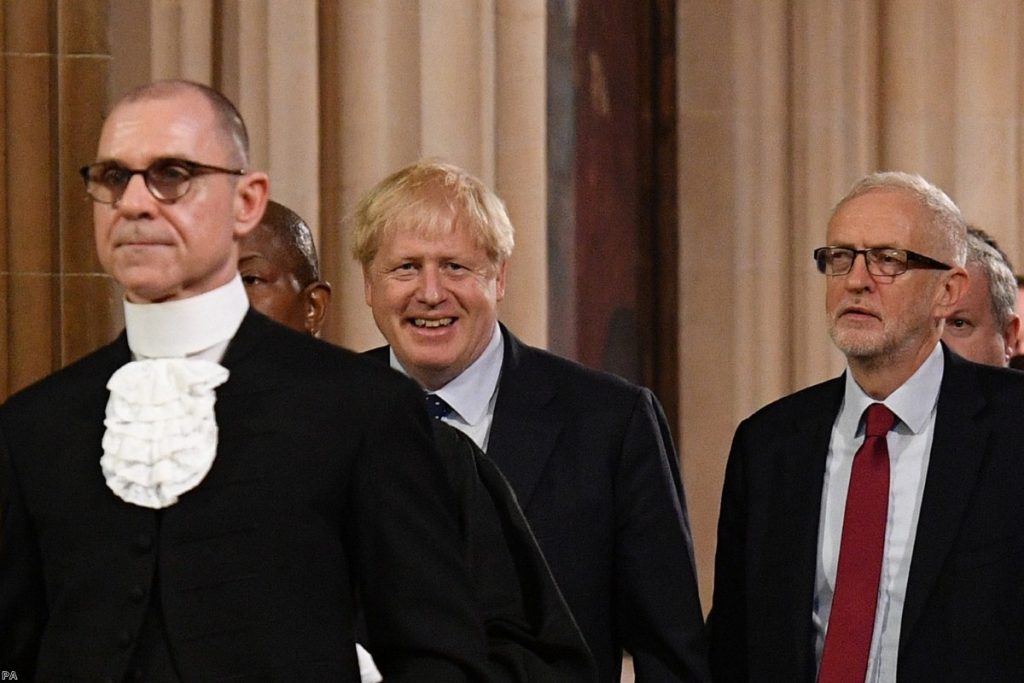 Boris Johnson and Jeremy Corbyn walk through Central Lobby after MPs were summoned to listen to the Queen