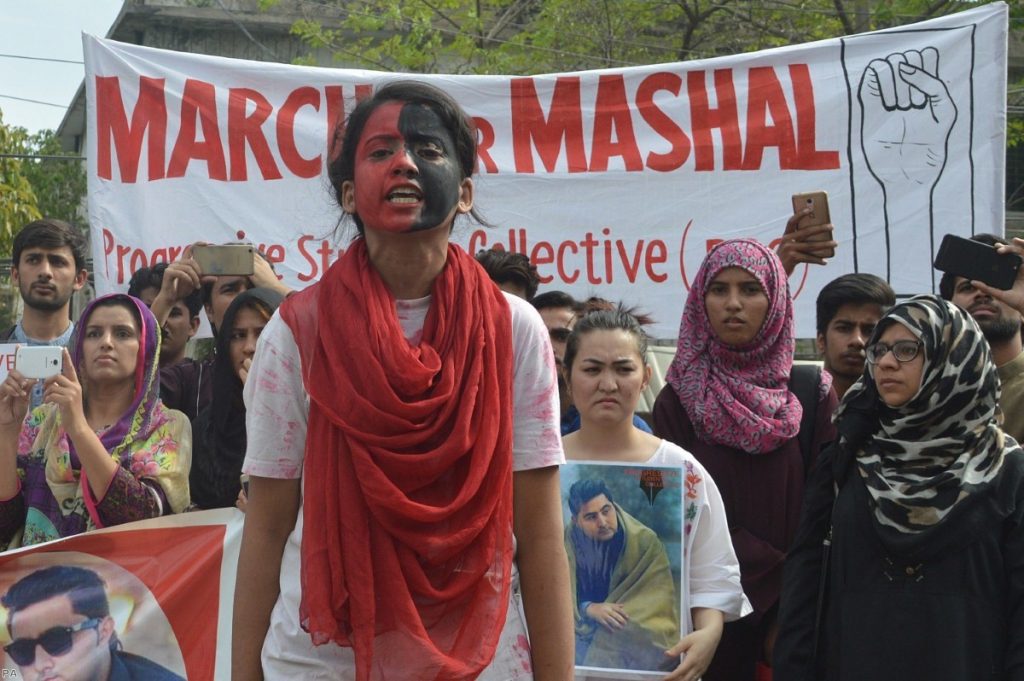 Pakistani activists hold a rally demanding justice for Mashal Khan, who was brutally murdered by a mob over false blasphemy allegations in 2017. 