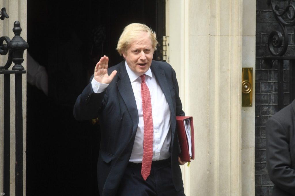 Boris Johnson leaves 10 Downing Street for the House of Commons ahead of his statement this afternoon 