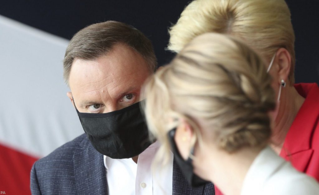 President Andrzej Duda casts his vote at a polling station in his hometown of Krakow, Poland, last Sunday.