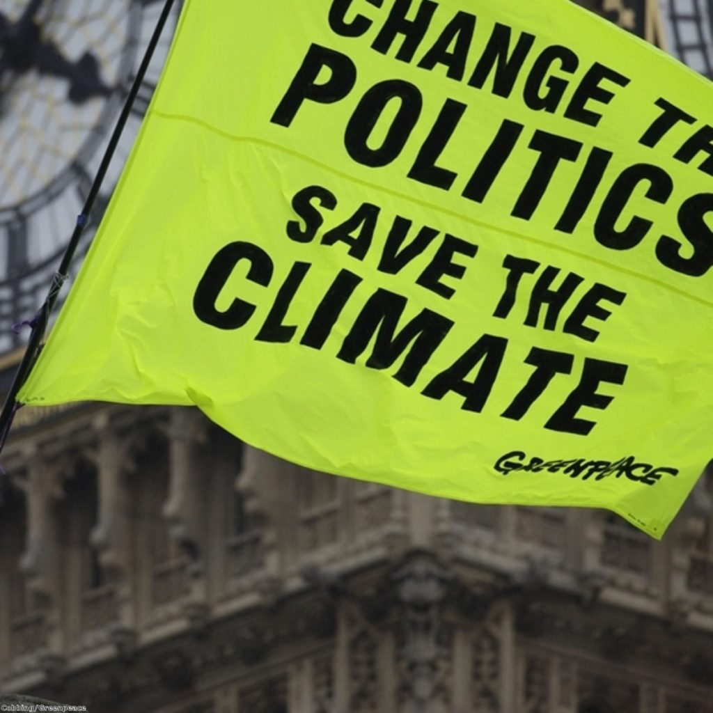 Greenpeace protestors occupy parliament roof