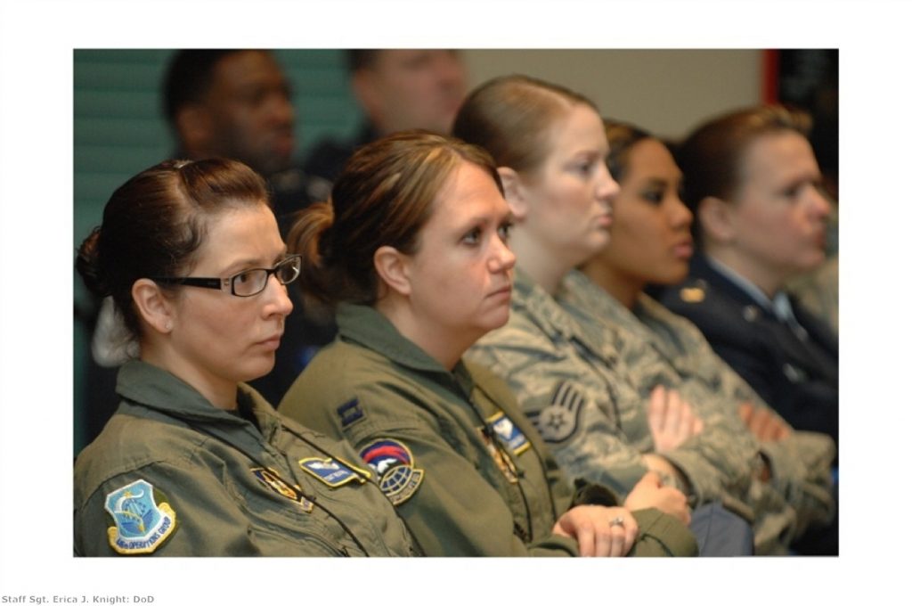 Women in the armed forces receive a briefing. Many younger women struggle to believe their predecessors' were not given equal rights at work.