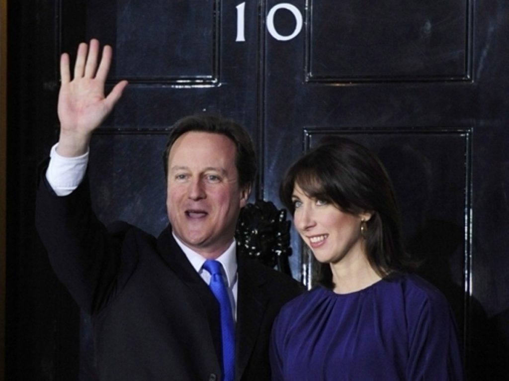 David and Samantha Cameron enter No 10