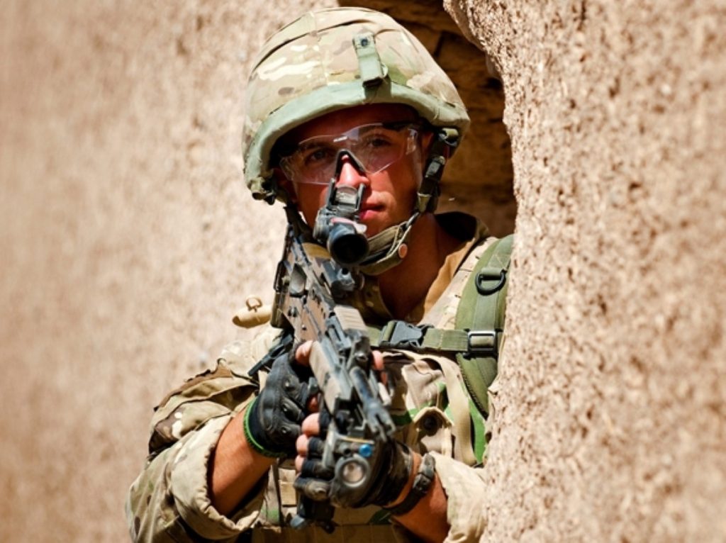 A soldier looks out from cover in Afghanistan. Could troops end up being sent to help out in Mali? 