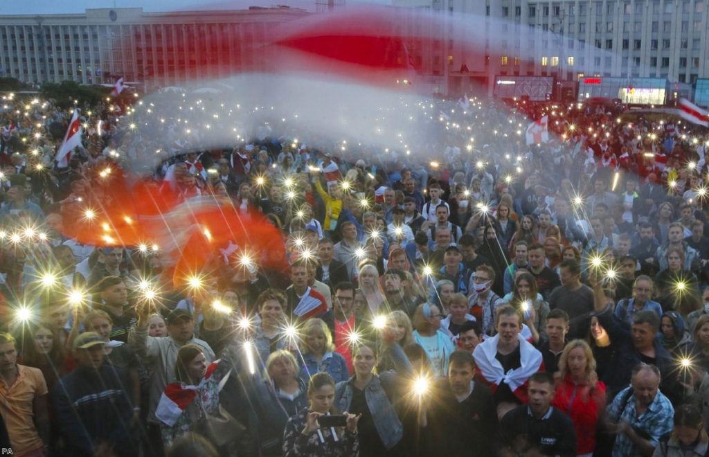 Belarusian opposition supporters light phones during a demonstration. The battle over the internet could define the way events play out.  