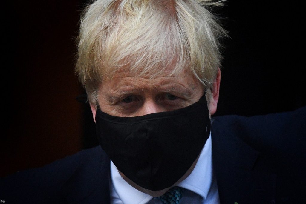 Johnson leaving 10 Downing Street on Monday to brief MPs on the coronavirus pandemic. 