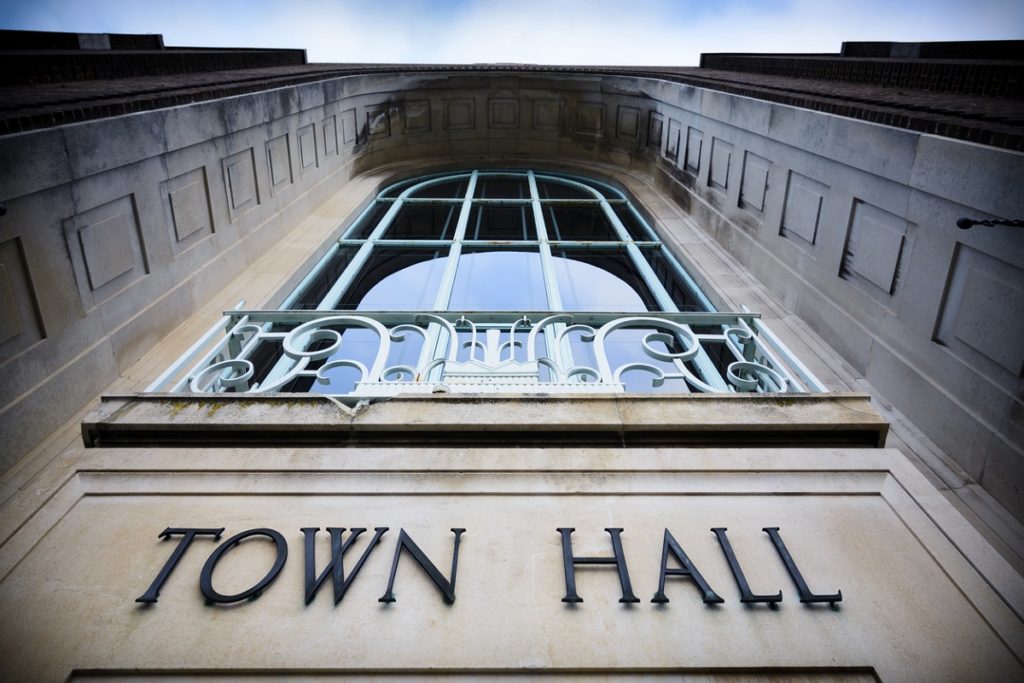 own hall sign at local government office with balcony