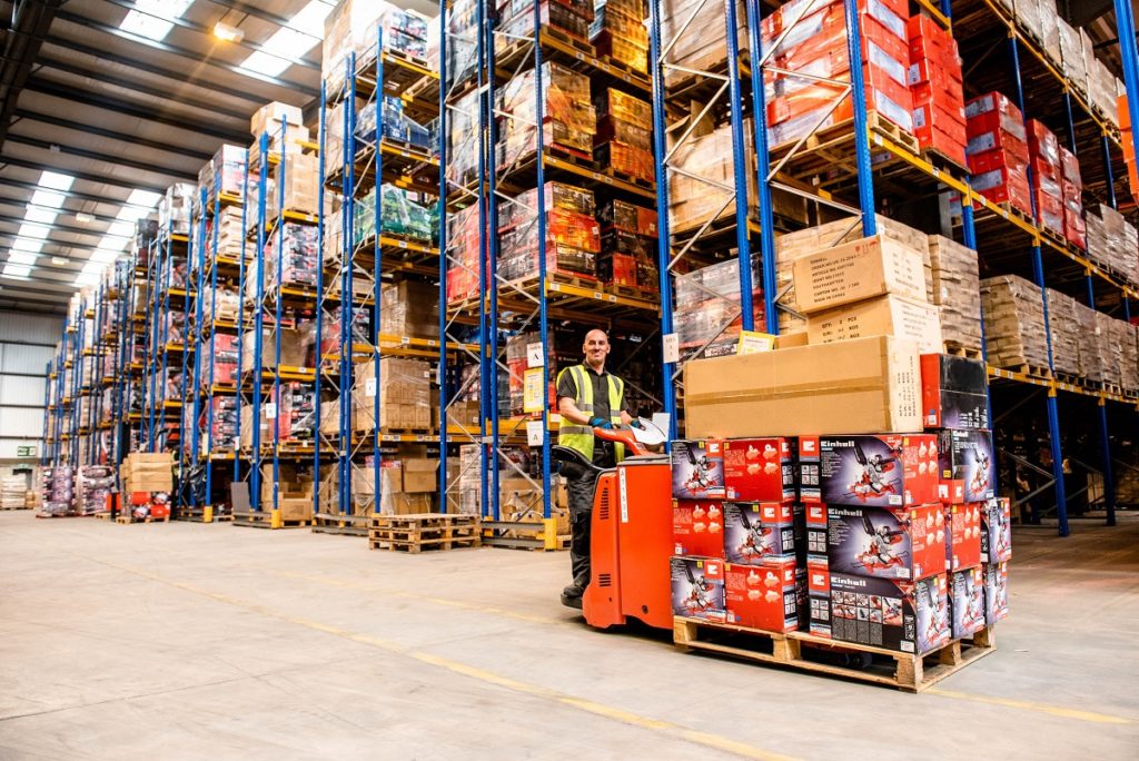 Forklift truck moves goods around a warehouse